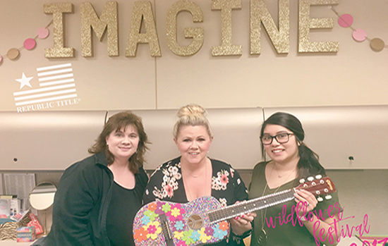 REPUBLIC TITLE DONATES GUITAR FOR ART AUCTION
